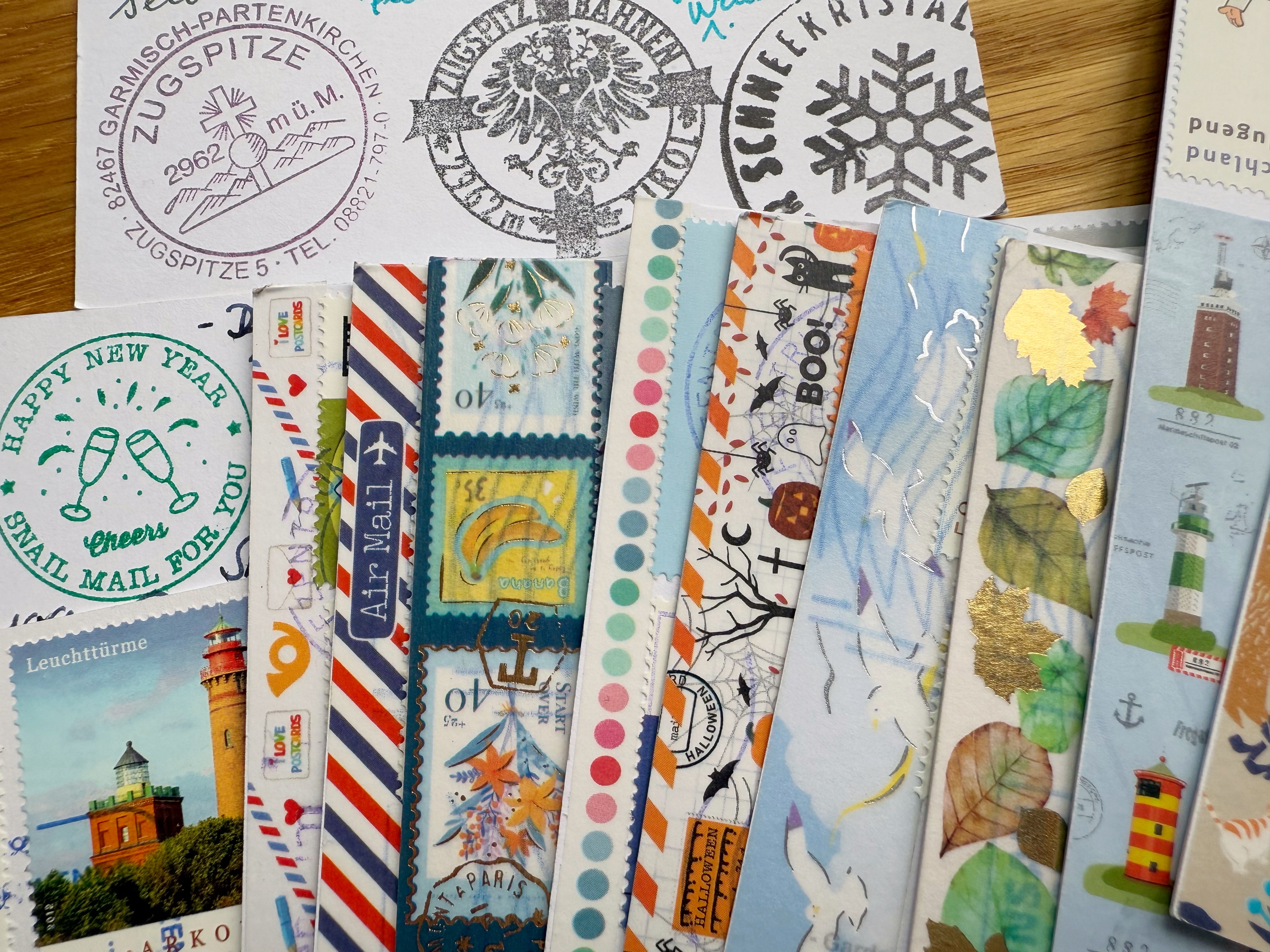 Washi tape and rubberstamps to decorate postcards